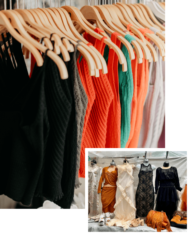 Clothing racks display various colorful tops on wooden hangers above, and multiple dresses with shoes and bags arranged below.